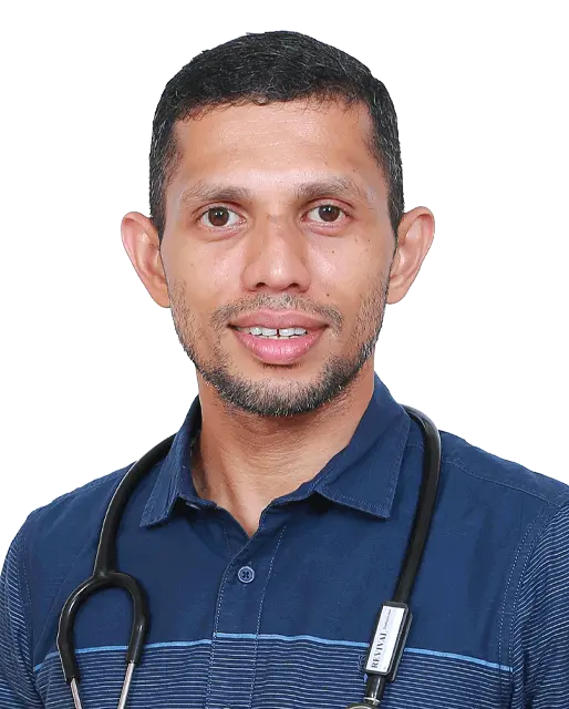 Hand specialist performing carpal tunnel surgery in a medical facility in Thrissur.