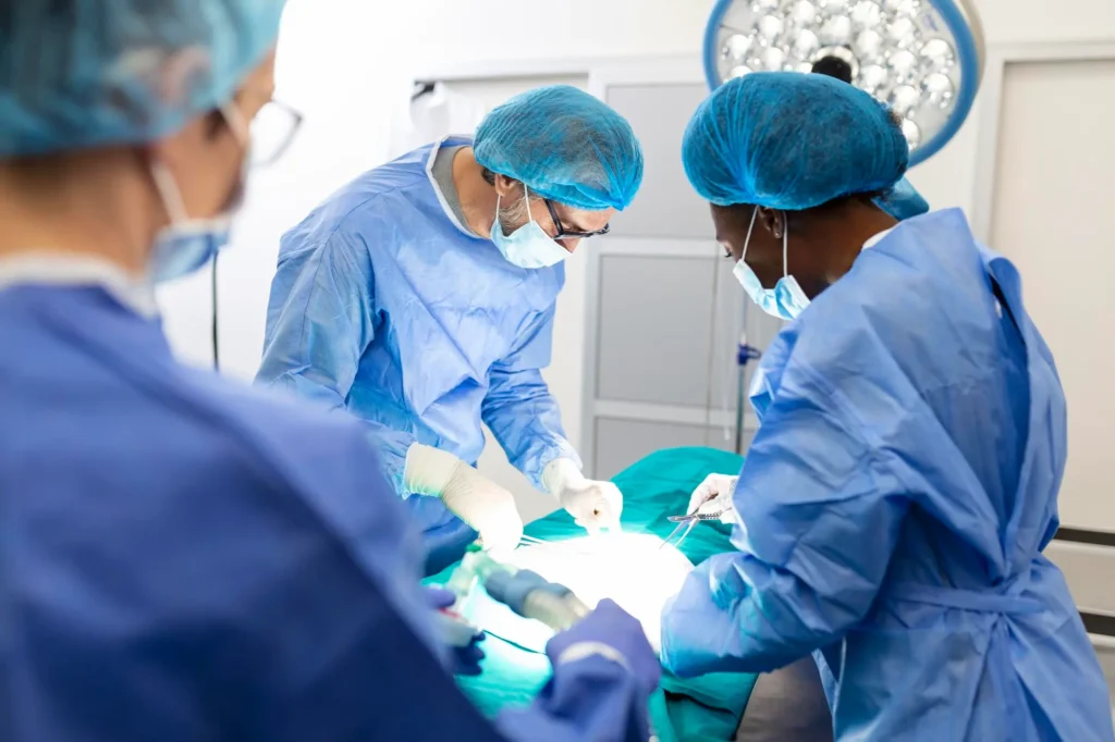 What Is Trauma Reconstruction Surgery showing surgeons performing advanced reconstructive surgical procedure in a modern operating room